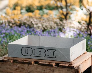 Pflanzentransportkarton von OBI aus 10% Rohrglanzgras (Foto Copyright: OBI)